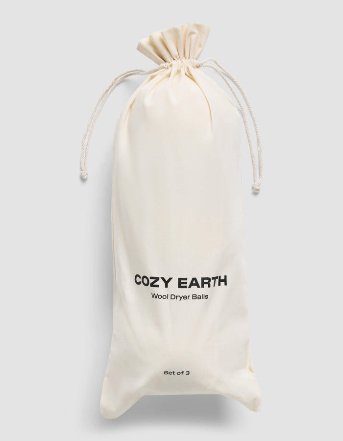 A cream-colored drawstring bag with "Cozy Earth Wool Dryer Balls" and "Set of 3" printed on it is displayed against a plain light gray background.|Size:Large