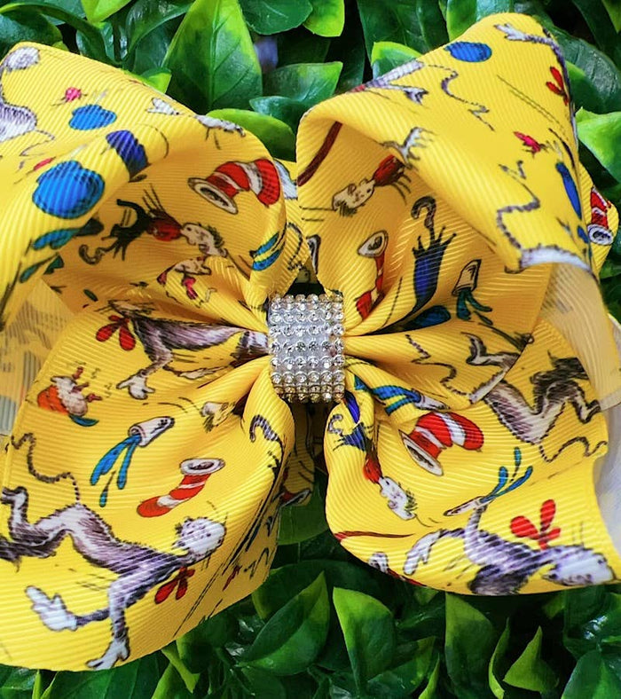 YELLOW CAT W/A HAT PRINTED HAIRBOWS. BW-DSG-967 4PCS/$10.